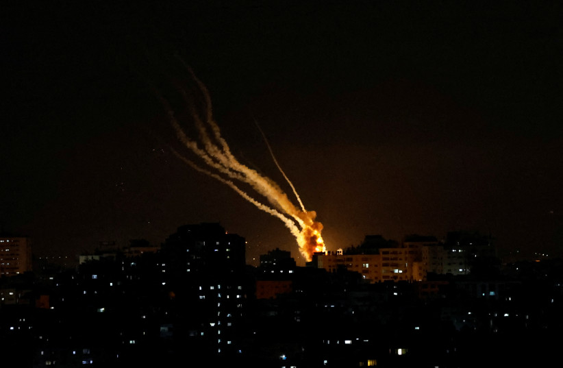  Rockets are fired from Gaza into Israel, in Gaza May 11, 2023 (Illustrative). (credit: MOHAMMED SALEM/REUTERS)