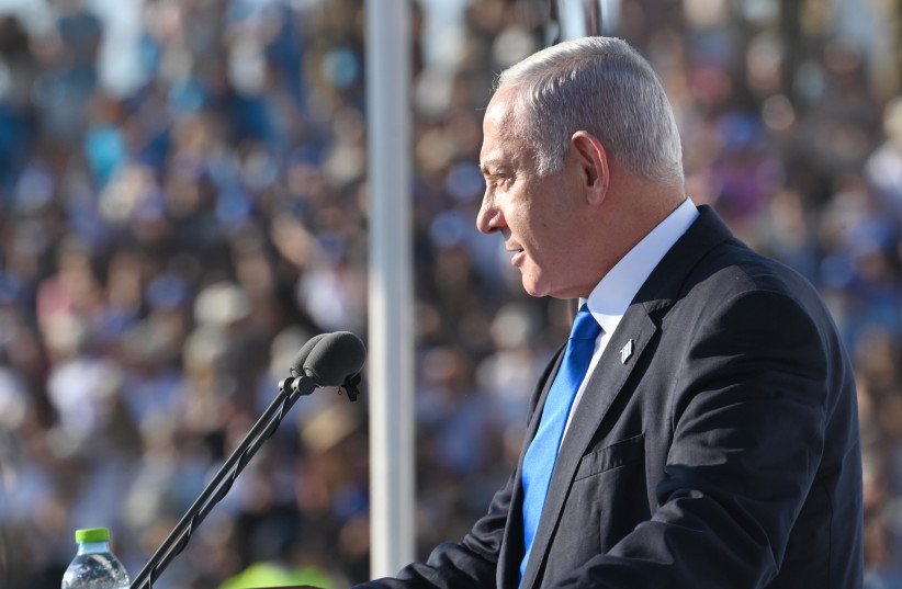  Prime Minister Benjamin Netanyahu speaks during an IDF ceremony on June 29, 2023 (credit: CHAIM ZACH / GPO)