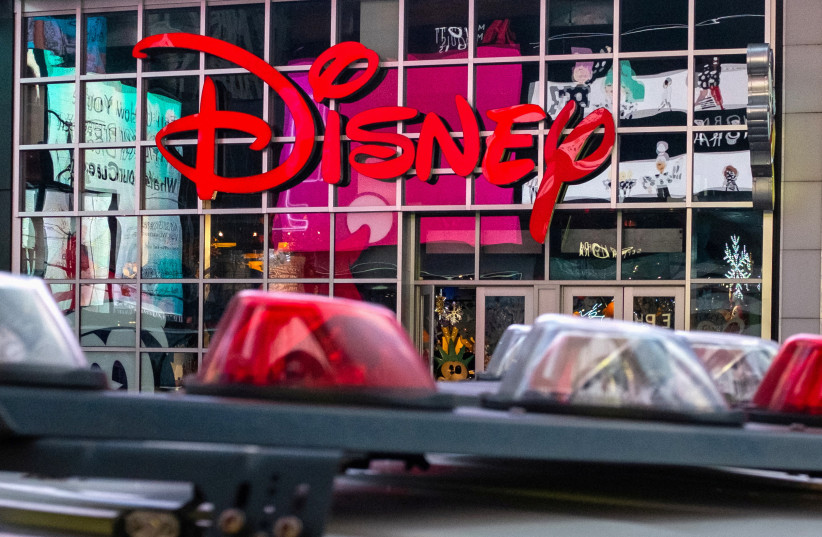  The logo of the Times Square Disney store is seen in Times Square, New York City, U.S. December 5, 2019. (credit: REUTERS/NICK PFOS)