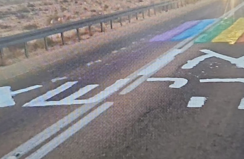  A Pride flag and the words ''here to stay'' on a road at the entrance to Mitzpe Ramon. (credit: ISRAEL POLICE)