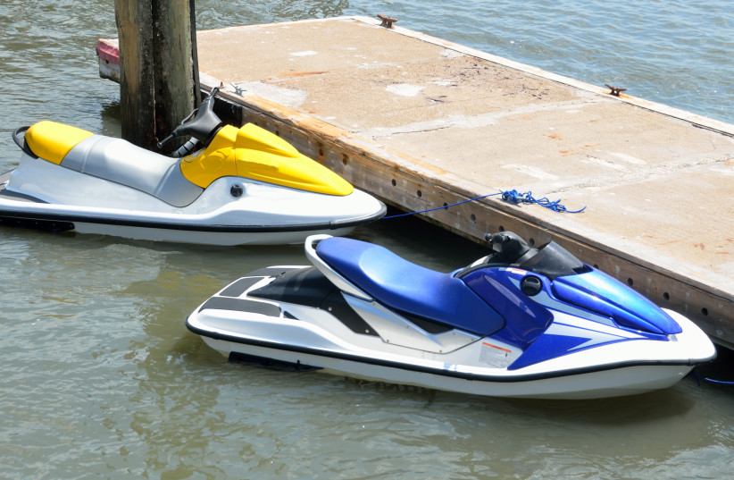  Jet skis are seen tied to a dock (credit: VIA PXFUEL)