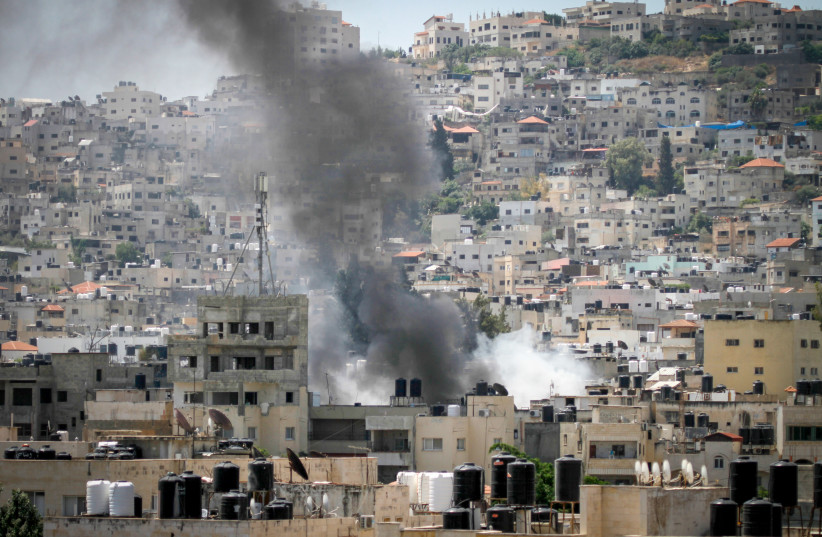  Smoke rises as Israel began a major aerial and ground offensive in the West Bank city of Jenin, in one of its biggest military operation in the Palestinian territory in years. July 3, 2023 (credit:  Nasser Ishtayeh/Flash90)