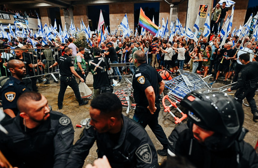  Israelis protest and clash with police during a protest against the Israeli government's planned judicial overhaul, at the Ben Gurion Airport near Tel Aviv, July 3, 2023 (credit: AMNON HORESH)