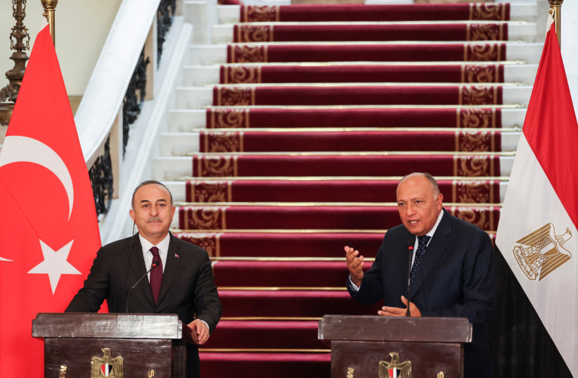Turkish Foreign Minister Mevlut Cavusoglu and Egyptian Foreign Minister Sameh Shoukry attend a news conference in Cairo, Egypt March 18, 2023.