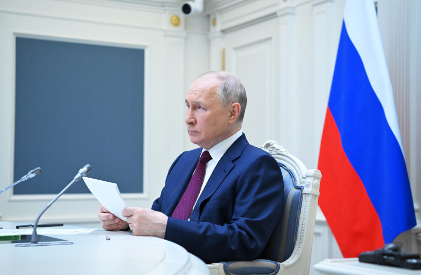 Russian President Vladimir Putin attends a summit of leaders of the Shanghai Cooperation Organisation (SCO) via a video conference call at the Kremlin in Moscow, Russia, July 4, 2023.