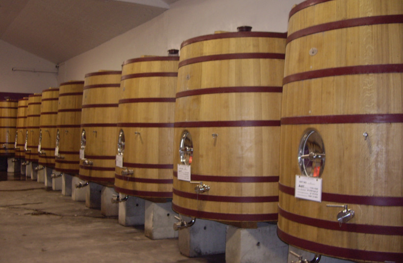  LARGE 5,000-LITER barrels at Zichron Ya’acov Cellars, known by the French word ‘foudre.’  (credit: CARMEL WINERY)