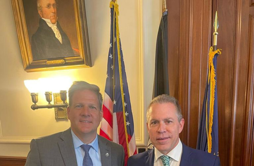  NH Gov. Christopher Sununu and Israel’s Permanent Representative to the United Nations, Ambassador Gilad Erdan, stand with the new NH law against the anti-Israel BDS movement (credit: Permanent Mission of Israel to the United Nations)