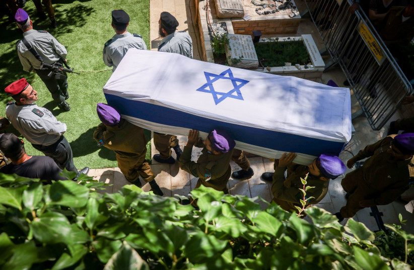 Thousands attend the funeral of Staff Sgt. Shilo Yosef Amir, killed in a shooting attack near Kedumim, at the Mount Herzl Military Cemetery in Jerusalem, on July 7, 2023.
