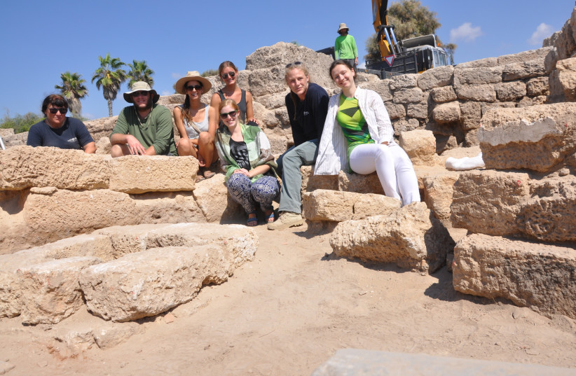 Beverly Goodman Tchernov (second from right) and her team of researchers pose at a site along the Caesarea Maritima coastline where they believe housed evidence of a tsunami deposit. (credit: UNIVERSITY OF HAIFA)