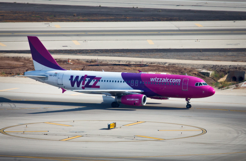 View of a ''Wizz Air'' flight, a Hungarian low-cost airline, taking off from Ben-Gurion Airport. September 03, 2014.  (credit: MOSHE SHAI/FLASH90)