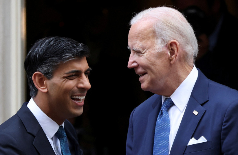  British Prime Minister Rishi Sunak and U.S. President Joe Biden react after their meeting at 10 Downing Street in London, Britain, July 10, 2023. (credit:  REUTERS/HOLLIE ADAMS TPX IMAGES OF THE DAY)