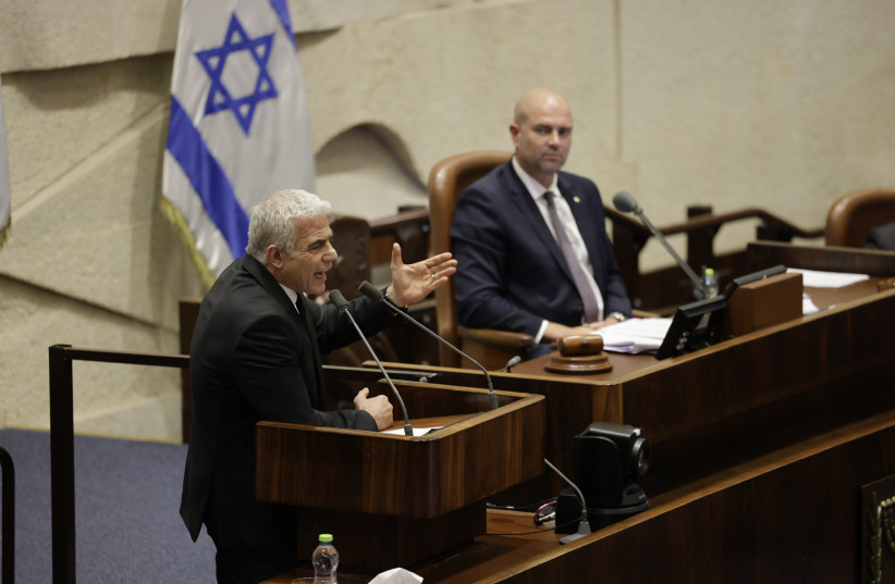Opposition Leader Yair Lapid speaking at the Knesset (credit: MARC ISRAEL SELLEM)