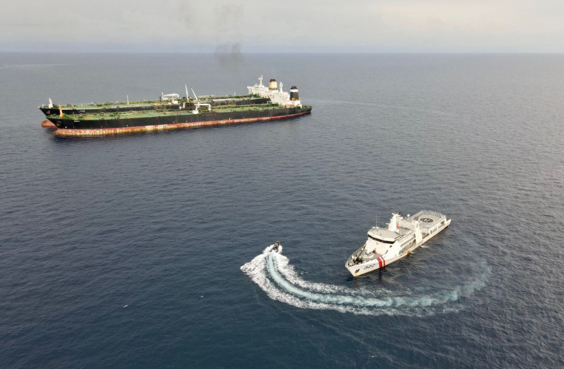  Patrol vessel KN. Pulau Marore-322, owned by Indonesia's Maritime Security Agency (Bakamla) patrols to inspect the Iranian-flagged Very Large Crude Carrier (VLCC), MT Arman 114, and the Cameroon-flagged MT S Tinos, as they were spotted conducting a ship-to-ship oil transfer without a permit (credit: Indonesia's Maritime Security Agency (Bakamla) / Handout via REUTERS)
