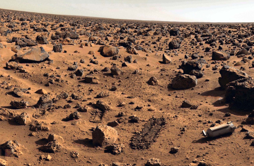  File photo taken on Mars approximately in September 1976 at Utopia Planitia by the US Viking 2 unmanned spacecraft. (credit: REUTERS)