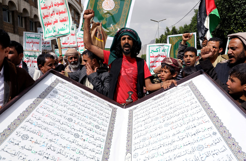  People rally to denounce the burning of the Koran in Sweden and the Israeli military operation in the West Bank city of Jenin, in Sanaa, Yemen July 4, 2023.  (credit: REUTERS/Khaled Abdullah TPX IMAGES OF THE DAY)