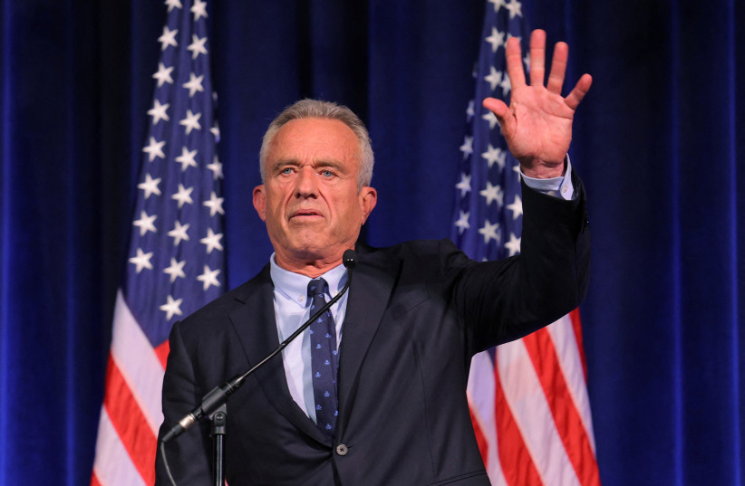Democratic presidential candidate Robert F. Kennedy Jr. waves to the audience after delivering a foreign policy speech at St. Anselm College in Manchester, New Hampshire, U.S., June 20, 2023. (credit: REUTERS/BRIAN SNYDER)