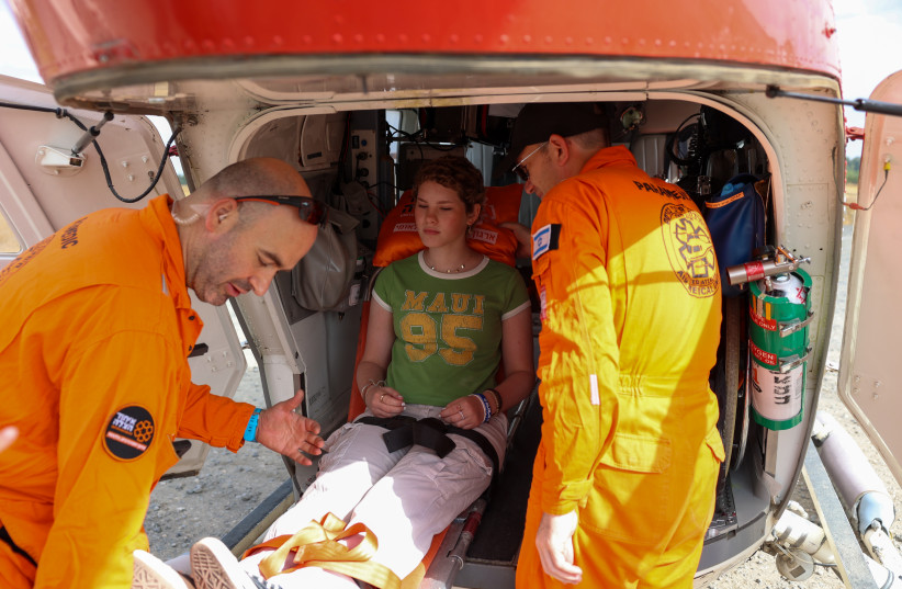  A young cancer patient named Raaya from the periphery is seen boarding a United Hatzalah helicopter to get treatment. (credit: UNITED HATZALAH‏)