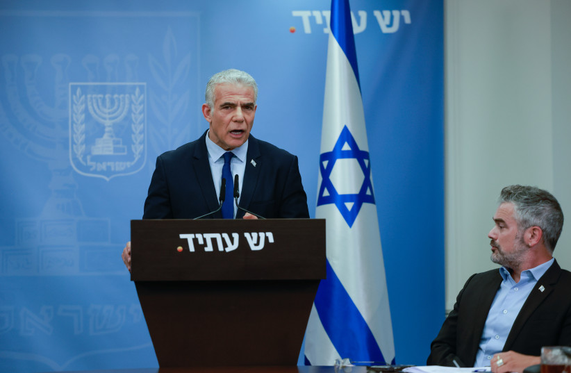 Head of the Yesh Atid party MK Yair Lapid speaks during a faction meeting at the Knesset, the Israeli parliament in Jerusalem, on July 17, 2023
