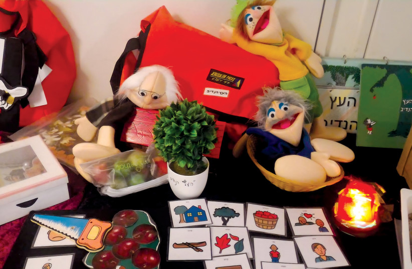  ADI’S INNOVATIVE Sensory Library Program pairs storybooks with puppets and communication boards to transform stories into multisensory experiences for residents and special education students with severe disabilities. (credit: ADI)
