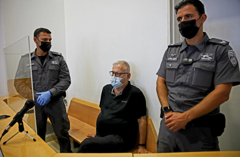  Giora Praff Perry, accused of murdering his wife, Esti Ahronovitz arrives for a court hearing the at the Beer Sheva District Court, southern Israel, on June 7, 2021. (credit: FLASH90)