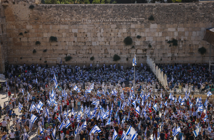  Anti-overhaul activists attend a special prayer at the Western Wall in Jerusalem's Old City, on July 23, 2023. (credit: Chaim Goldberg/Flash90)