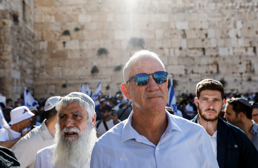  Benny Gantz head of National Unity attends a gathering at the Western Wall, Judaism's holiest prayer site, on a day of planned mass demonstrations against Israeli Prime Minister Benjamin Netanyahu and his nationalist coalition government's judicial overhaul, in Jerusalem, July 23, 2023.  (credit: REUTERS/AMIR COHEN)