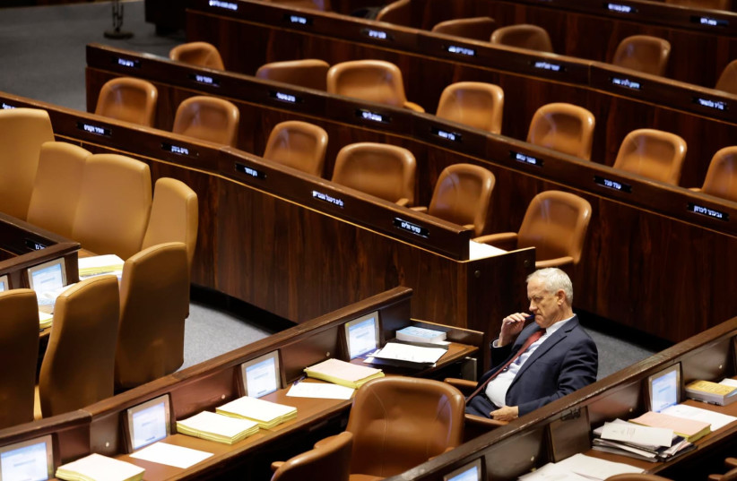  National Unity Party head Benny Gantz sits in the Knesset Plenum ahead of Monday's reasonableness standard bill, July 23, 2023.  (credit: MARC ISRAEL SELLEM/THE JERUSALEM POST)
