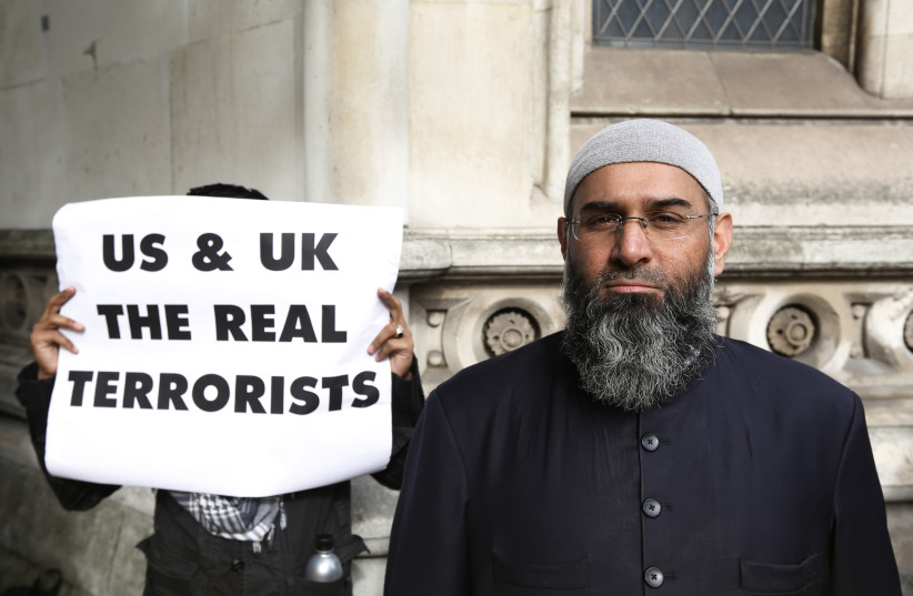  Demonstrator Anjem Choudary, protests in support of Islamist cleric Abu Hamza al-Masri, who is appealing against his extradition to the US, outside the High Court in London October 5, 2012. (credit: REUTERS/LUKE MACGREGOR)