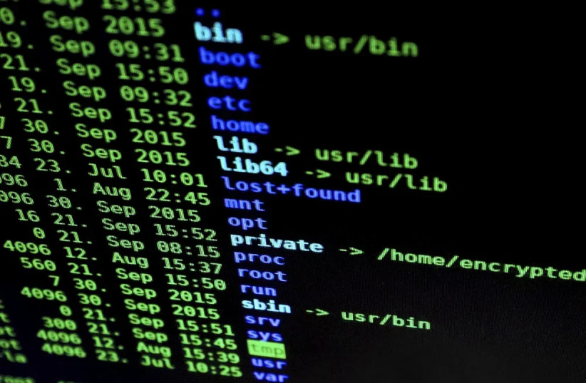 Black screen with digital data displayed in blue and green.
