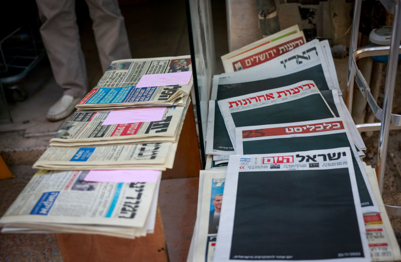  The headlines of the newspapers in Israel at a shop in Jerusalem, July 25, 2023, a day after the reasonableness bill passed at the assembly hall of the Knesset (credit: CHAIM GOLDBEG/FLASH90)