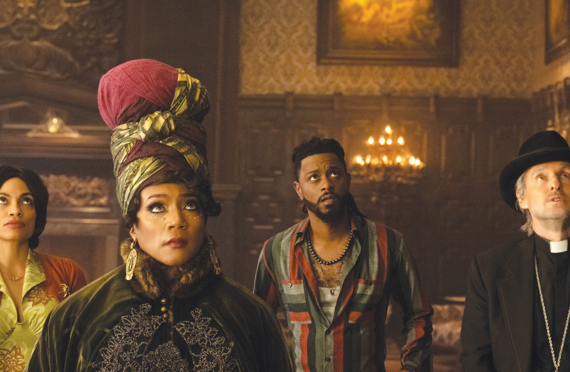  FROM LEFT, Rosario Dawson, Tiffany Haddish, LaKeith Stanfield, and Owen Wilson in Disney’s live-action ‘Haunted Mansion.’  (credit: Jalen Marlowe/Disney/TNS)