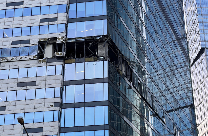  A view shows the damaged facade of an office building in the Moscow City following a reported Ukrainian drone attack in Moscow, Russia, July 30, 2023 (credit:  REUTERS/STAFF)