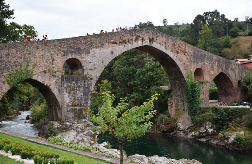 The Roman Bridge of Cangas de Onís in the Asturias region of Spain. (credit: PXFUEL)