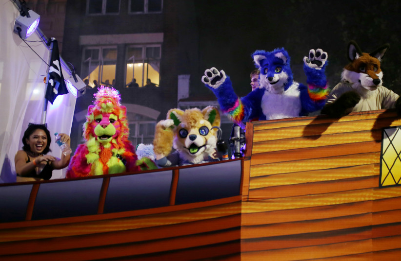 A float featuring participants dressed as furry animals passes in the parade during the annual Sydney Gay and Lesbian Mardi Gras in Sydney, Australia March 4, 2017. (credit: REUTERS/Steven Saphore)