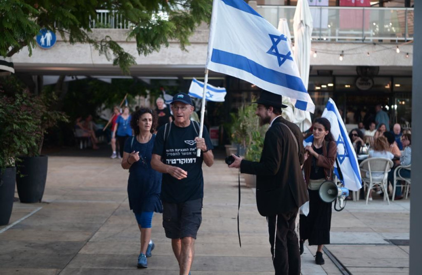  Israeli protesters are seen during a march in Tel Aviv on August 2, 2023 (credit: AVSHALOM SASSONI/MAARIV)