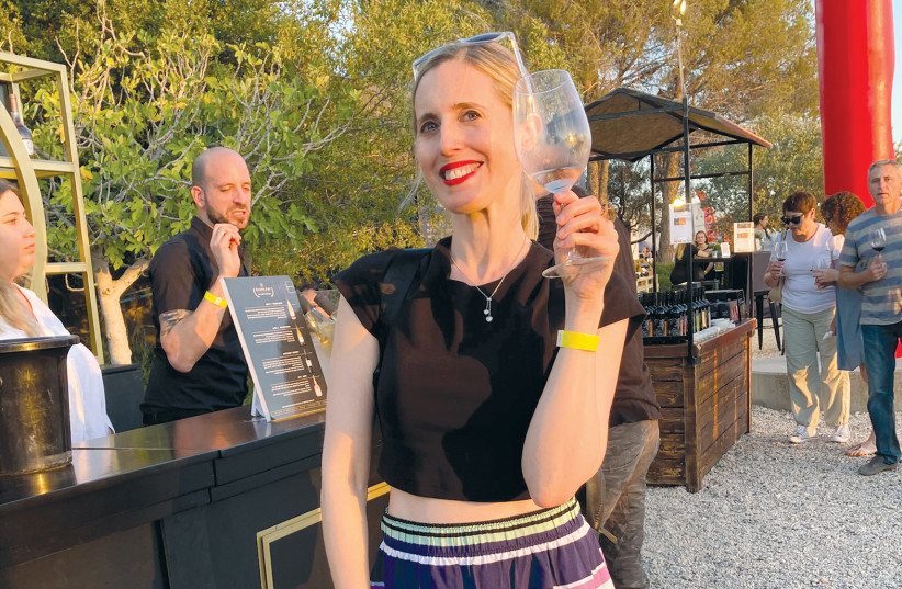  EDITOR ERICA SCHACHNE gets her wine on with the writer on the festival’s first night. (credit: LIAM FORBERG)