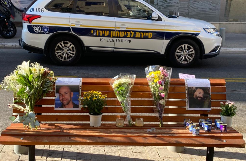  Flowers and memorial candles are seen on a bench in Tel Aviv in memory of city inspector Chen Amir, who was killed the previous night in a terrorist attack, on August 6, 2023. (credit: AVSHALOM SASSONI/MAARIV)