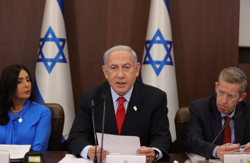 Prime Minister Benjamin Netanyahu attends the weekly cabinet meeting in the prime minister's office in Jerusalem, 30 July 2023. (credit: Abir Sultan/Pool via REUTERS)