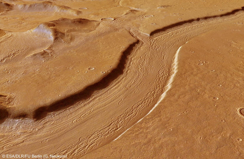 A computer-generated perspective view of Reull Vallis created using data obtained from the High-Resolution Stereo Camera (HRSC) on ESA’s Mars Express. (credit: ESA/DLR/FU BERLIN)