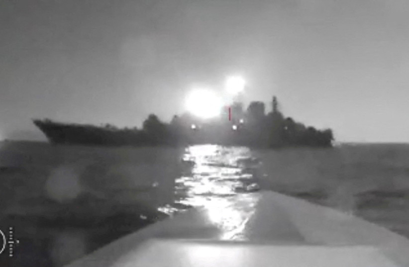  A sea drone shows the silhouette of Olenegorsky Gornyak ship near the port of Novorossiysk, Russia, in this screengrab obtained from social media video released on August 4, 2023 (credit: VIA REUTERS)