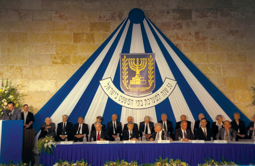  A ceremony marking 50 years of law in Israel at the Supreme Court in Jerusalem in 1998, in the presence of then-chief justice Aharon Barak, flanked by Prime Minister Benjamin Netanyahu and then-president Ezer Weizman. (credit: Avi Ohayon/GPO)