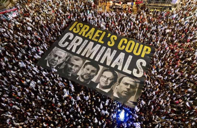 Protest sign against the judicial reform, Kaplan, Tel-Aviv Saturday evening August 12, 2023. (credit: GILAD FURST)