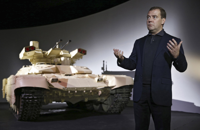  Russia's Dmitry Medvedev speaks during a presentation of the BMPT-72 tank, dubbed the ''Terminator-2'' (credit: REUTERS)