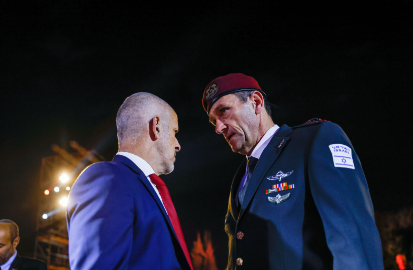IDF Chief of Staff Herzi Halevi speaks with Ronen Bar, head of the Shin Bet security services during a ceremony held at the Yad Vashem Holocaust Memorial Museum in Jerusalem, as Israel marks annual Holocaust Remembrance Day. April 17, 2023.