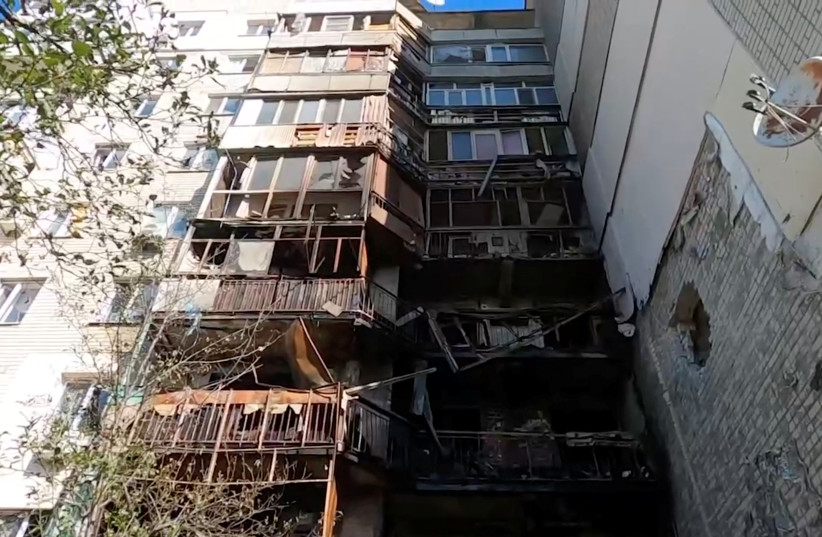 A heavily damaged apartment after a Russian overnight shelling in Kherson, Ukraine August 7, 2023 (credit: REUTERS)