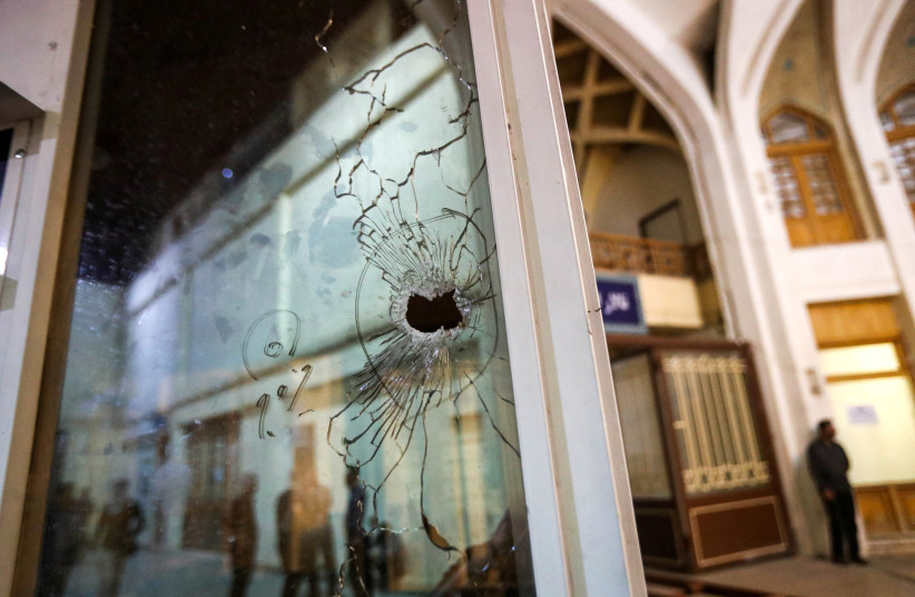  A bullet hole is seen after an attack at the Shah Cheragh Shrine in Shiraz, Iran August 13, 2023 (credit: REUTERS)