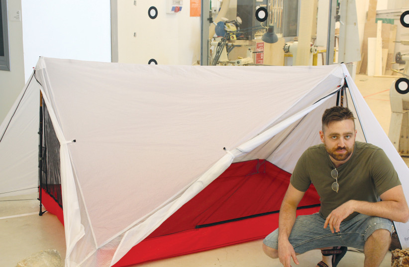  RAFAEL AMZALLAG with his ultra light, easy-to-assemble tent. (credit: BEN BRESKY)