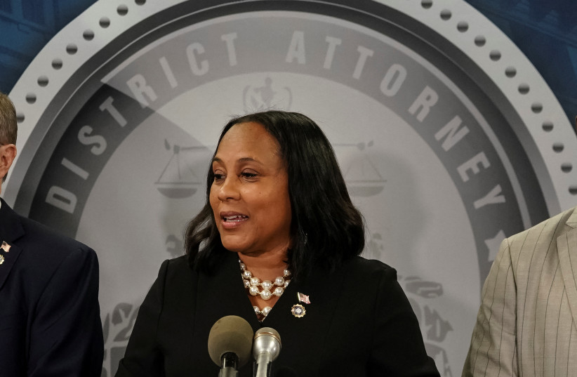  Fulton County District Attorney Fani Willis speaks to the media after a Grand Jury brought back indictments against former president Donald Trump and 18 of his allies in their attempt to overturn the state's 2020 election results, in Atlanta, Georgia, US August 14, 2023.  (credit: ELIJAH NOUVELAGE/REUTERS)
