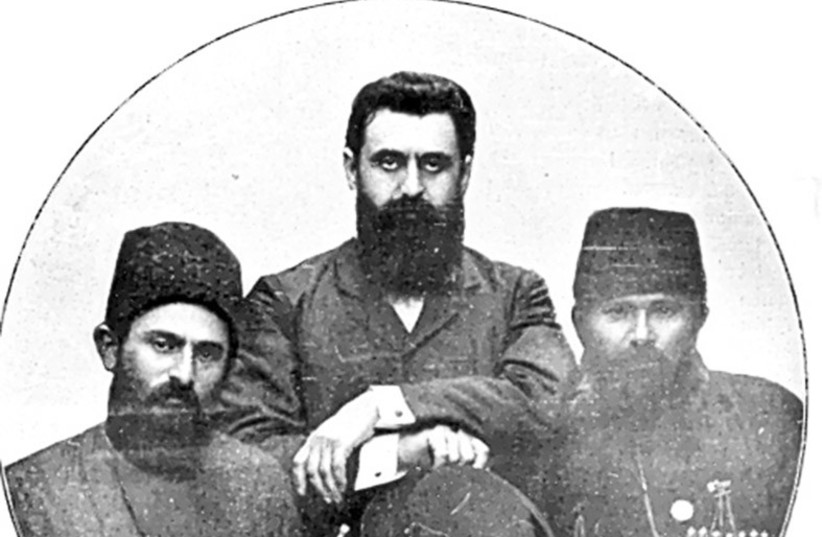  RUSSIAN MOUNTAIN Jews Matatyahu Bogatyrev and Shlomo Mordekhaev pose with Theodor Herzl at the First Zionist Congress in 1897.  (credit: Beth Hatefutsoth Photo Archive/ Wikimedia Commons)