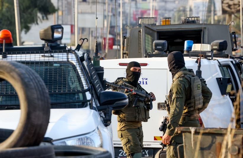 Israeli security forces secure the scene of a shooting attack in Huwara, in the West Bank, near Nablus, August 19, 2023.  (credit: FLASH90)